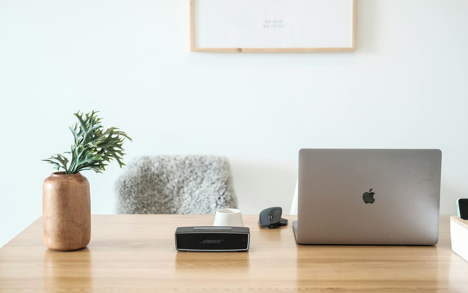 Home office desk used for organizing and protecting digital work