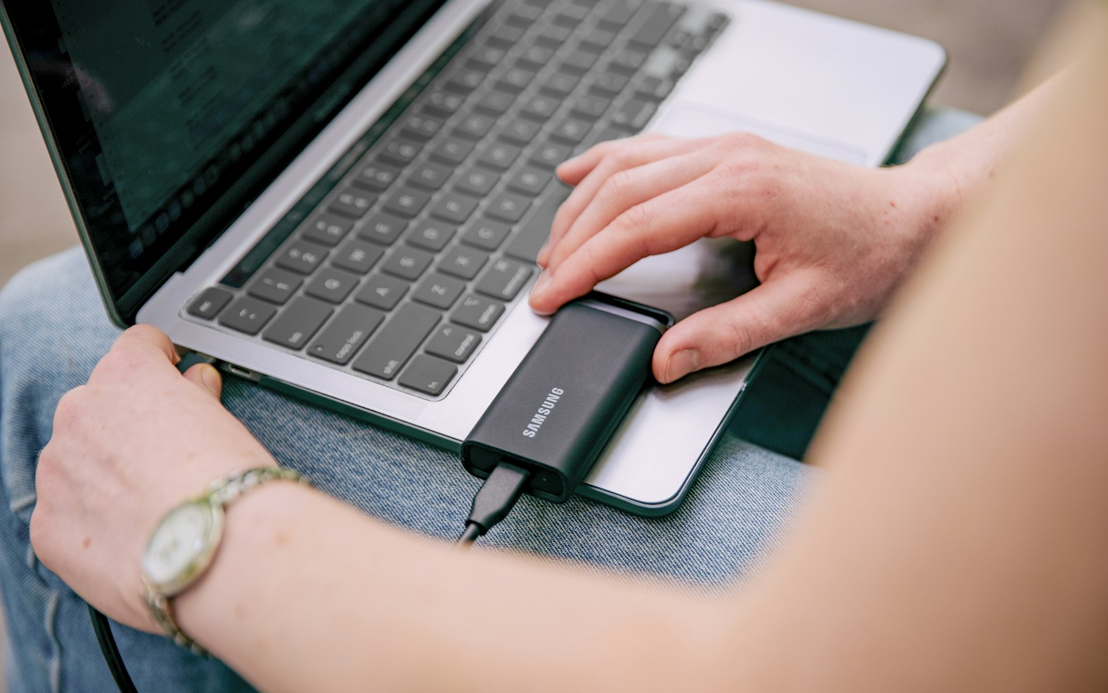 Laptop and mouse used for planning storage capacity