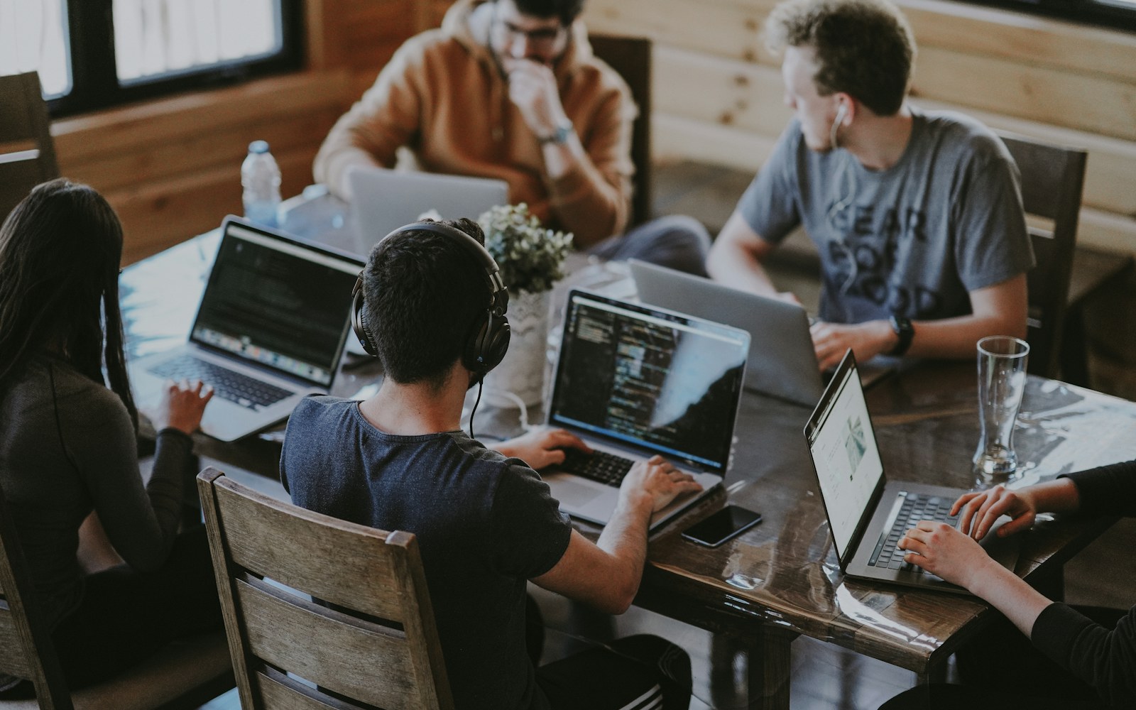 Colleagues working together on a software workflow