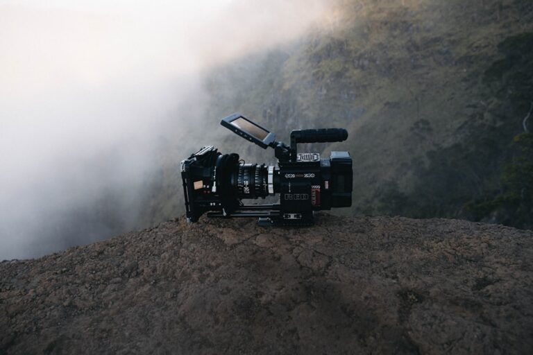Portable cinema camera on a rocky outdoor location